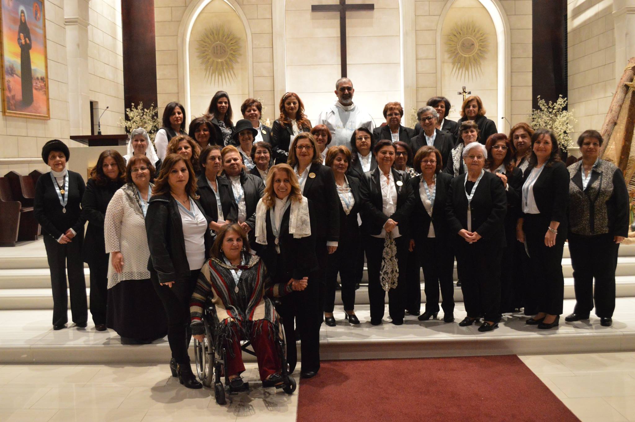 Daughters of the Immaculate Conception gathered on the altar steps